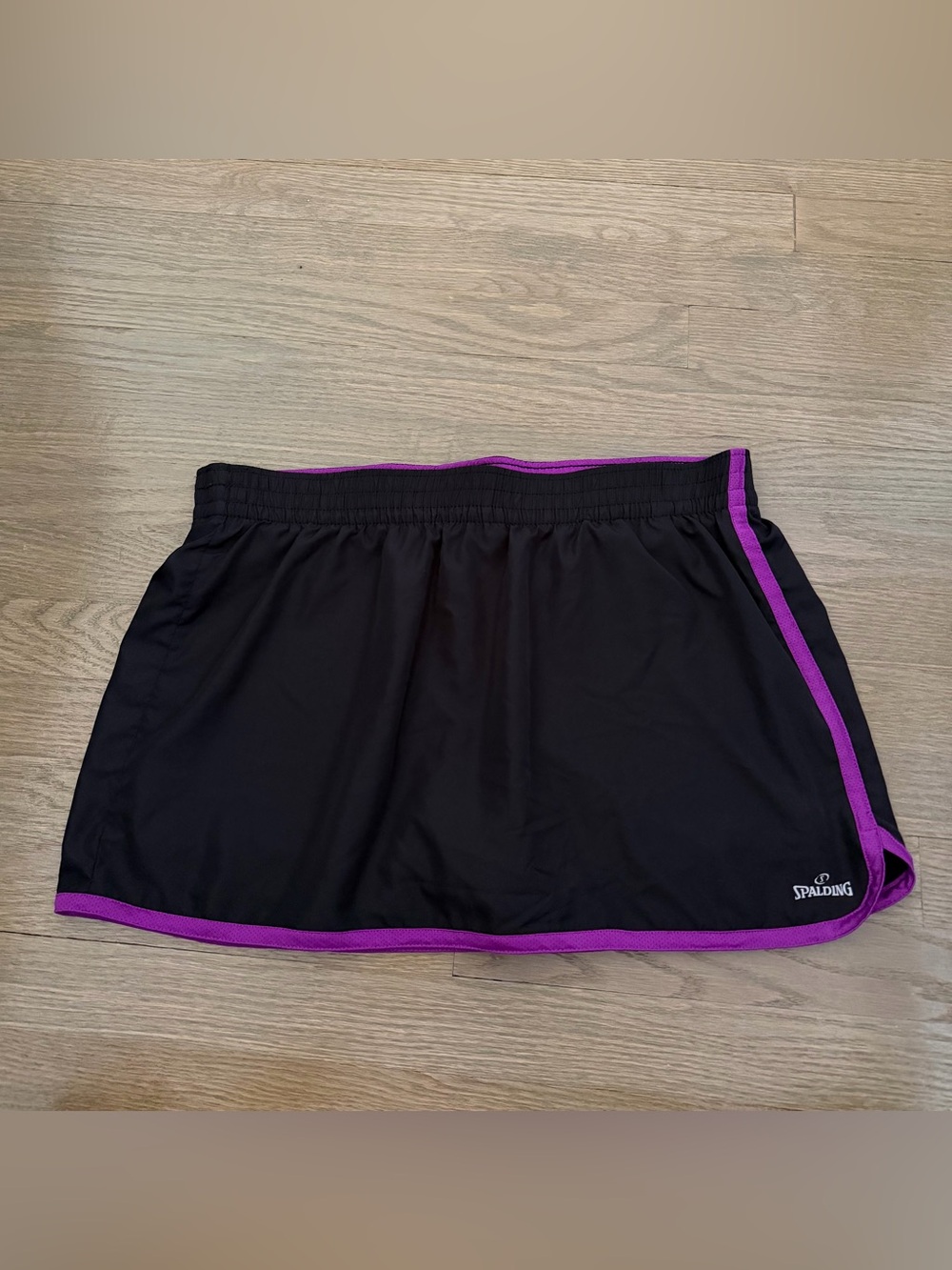 Spalding black athletic skort with purple trim Size large